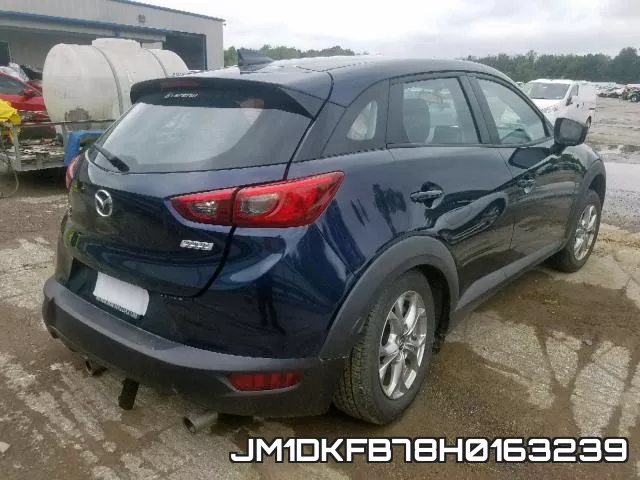 JM1DKFB78H0163239_4.webp