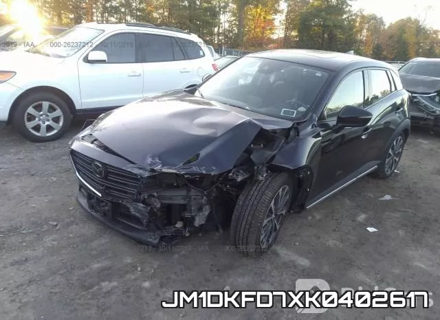 JM1DKFD7XK0402617_2.webp
