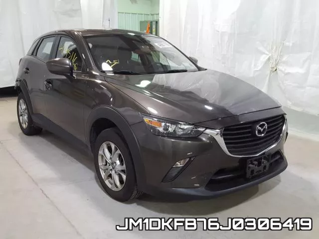 JM1DKFB76J0306419_1.webp