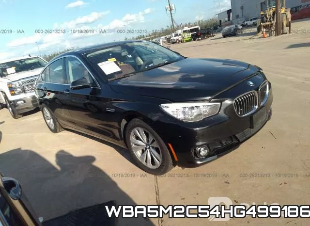 WBA5M2C54HG499186_1.webp